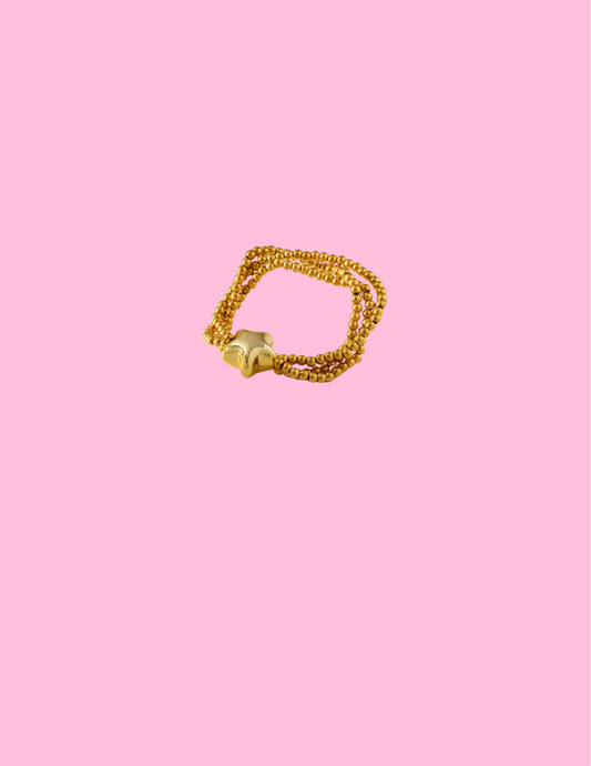 Gold start bracelet
