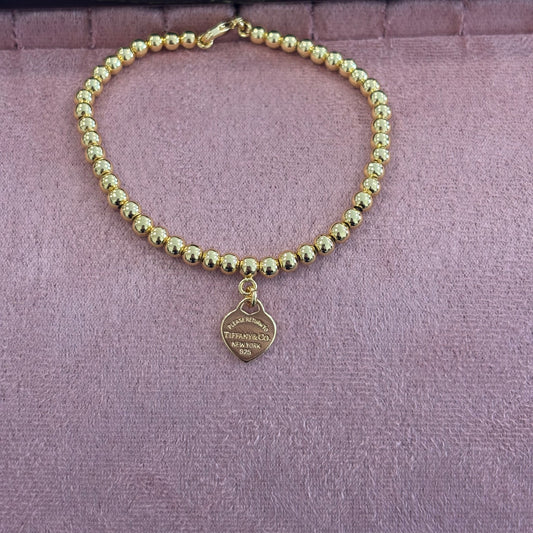 T&C Bracelet Gold
